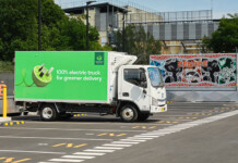 Zenobē and Woolworths drive largest electric truck rollout Rendered image of an electric Woolworths-branded delivery truck in front of Zenobe signage in a car park