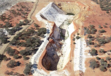 Gold mine to run on renewables through Pacific Energy PPA Aerial shot of a large open-cut gold mine surrounded by red dirt and scrub