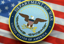 Pentagon funds world-first Scandium mine in Australia United States Department of War insignia against US flag