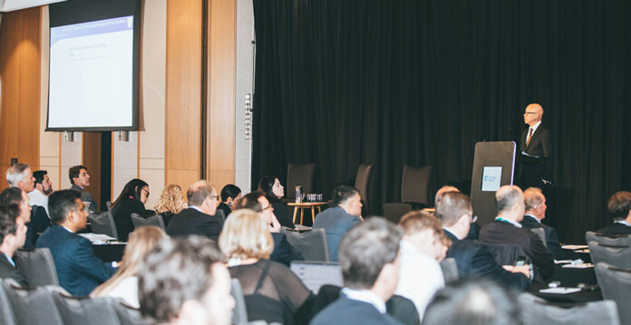 energy-in-wa-conference-1 Male executive speaks at lectern to audience at an energy conference