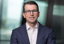 CS Energy appoints Stephen Harty as new CEO Head and shoulders shot of smiling male executive Stephen Harty wearing glasses and a dark business suit