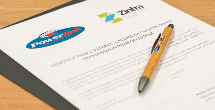 Contract for transmission upgrade works bearing Powerlink and Zinfra logos, with a pen on top