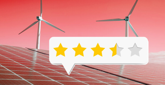Wind turbines and solar panels with star rating placard imposed on top