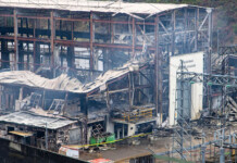 Investigation underway into Tungatinah Power Station fire Fire-ravaged structure and debris after Tungatinah Power Station fire